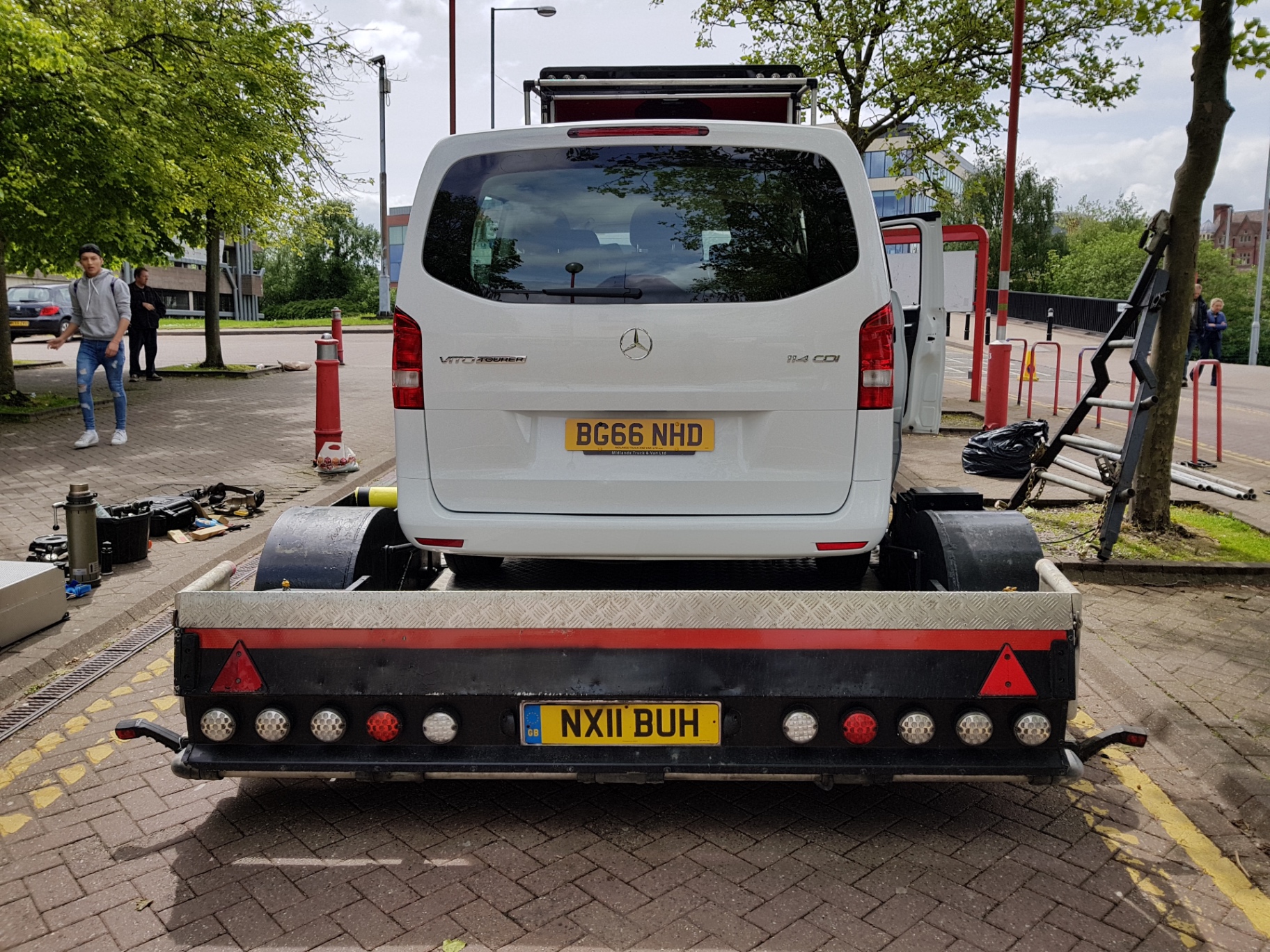 Picture vehicle secured on the tracking low loader